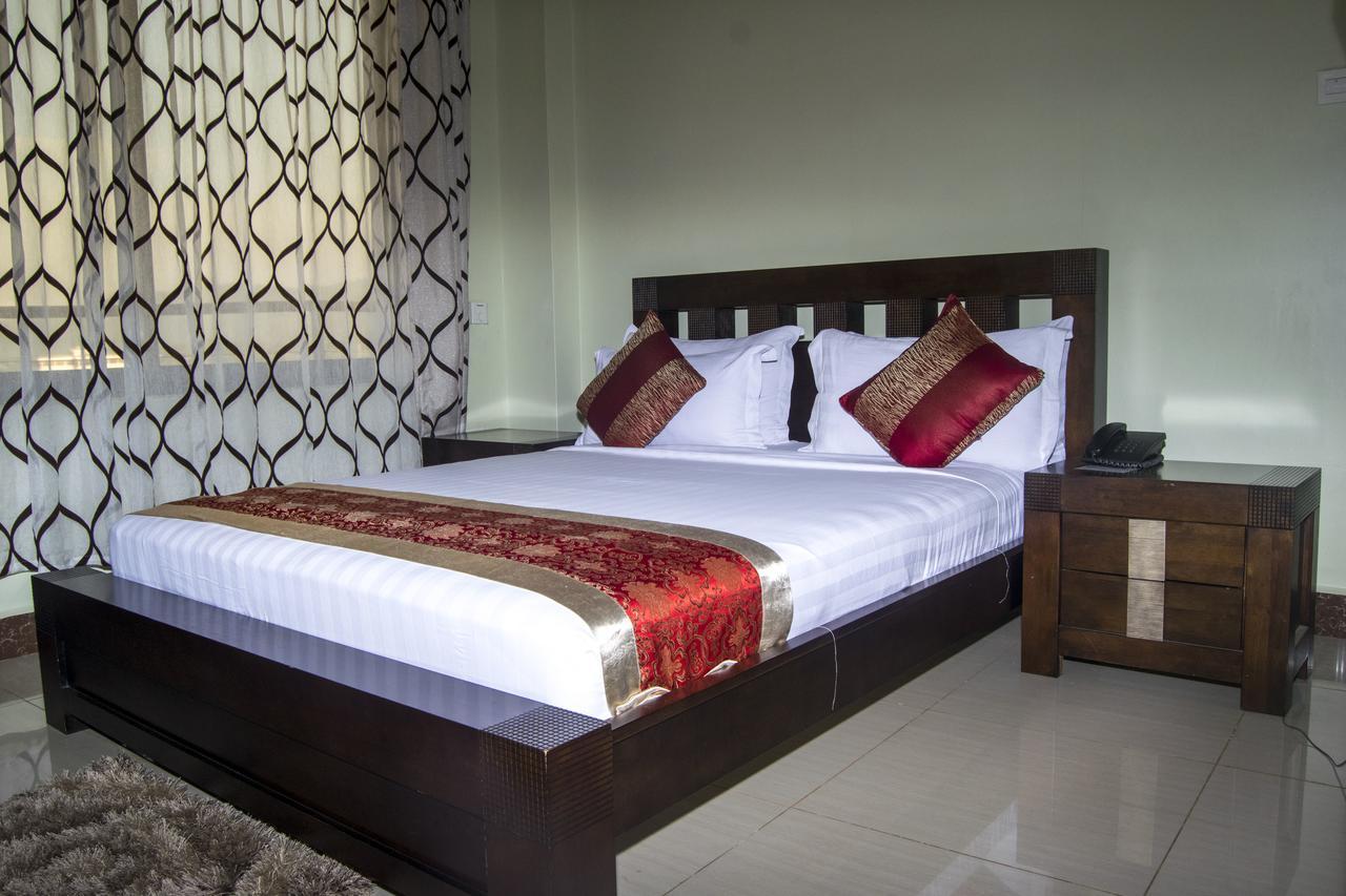 Flomi Hotel Morogoro Quarto foto